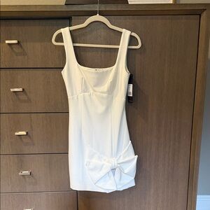 Elliatt Cream Mini Dress with Bow Accent